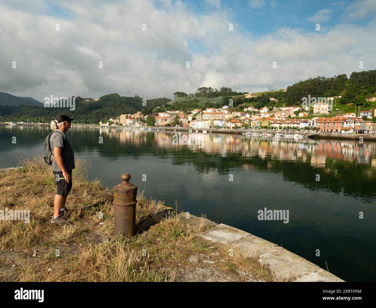 Cool middle aged man hiking and contemplating view in Northern Spain Stock Photo