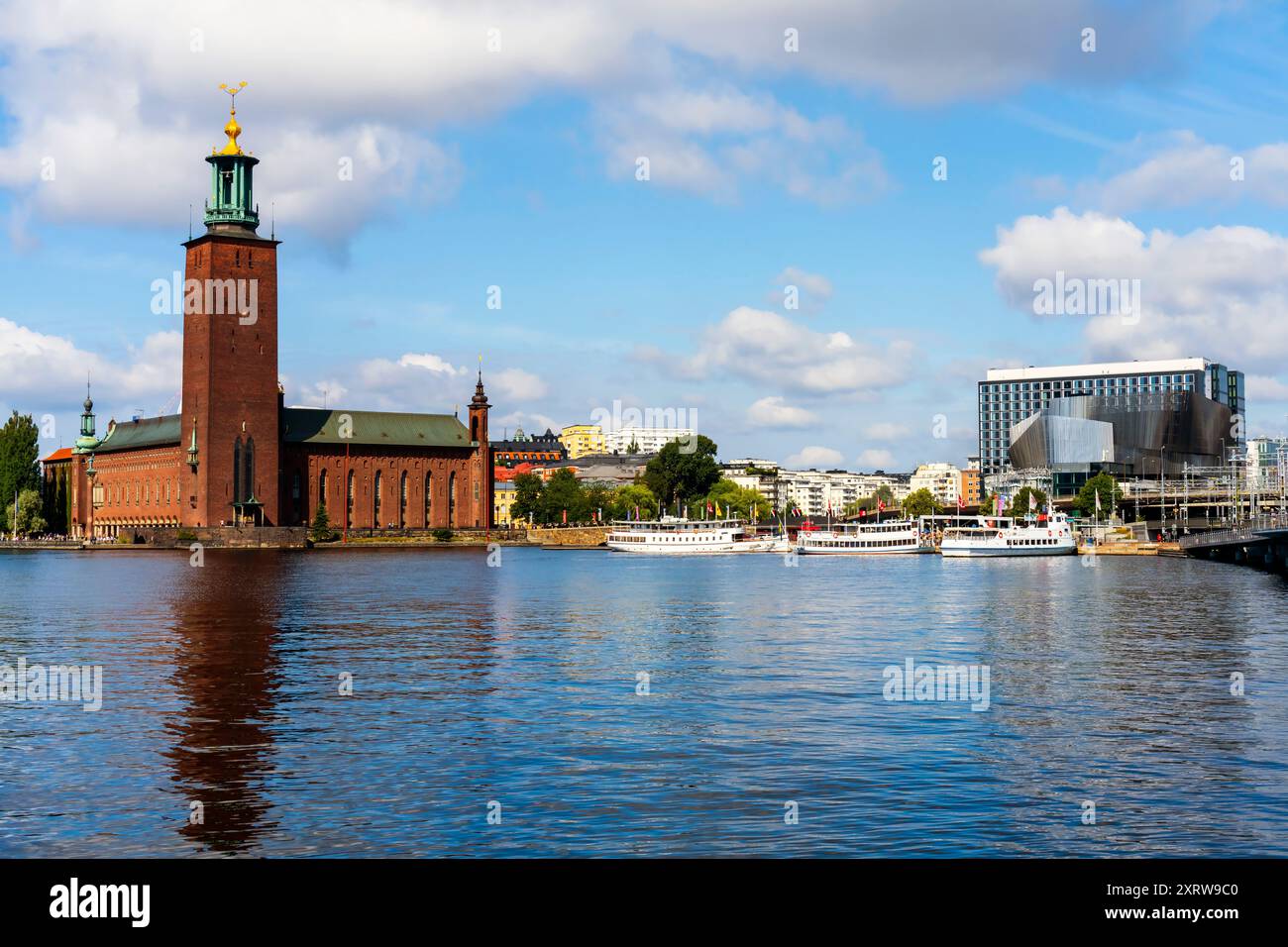 Stockholms famous landmark City Hall Tower located on coast of Kungshomen island in Stockholm, Sweden. Stock Photo