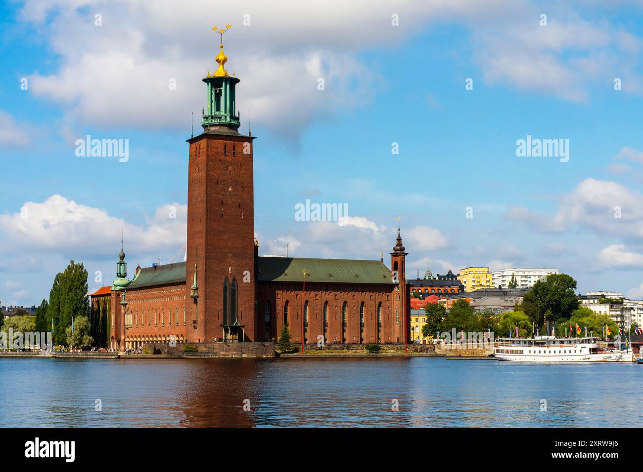 Stockholms famous landmark City Hall Tower located on coast of Kungshomen island in Stockholm, Sweden. Stock Photo