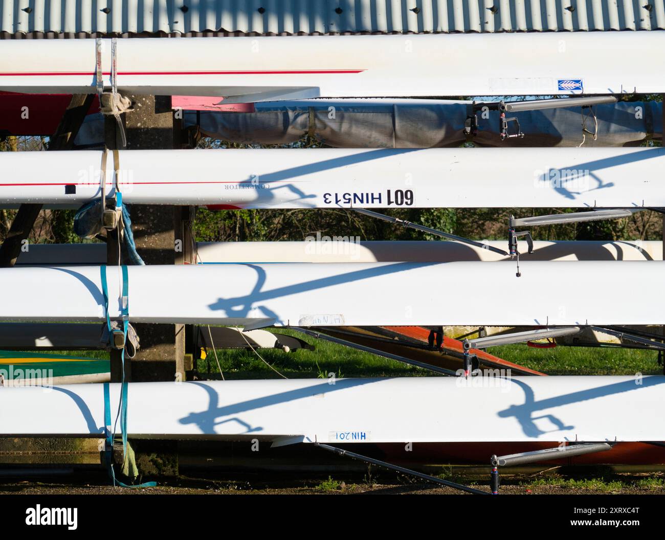 Local Rowing Boathouse Racked sculls outside Radley boathouse by the Thames create these ...