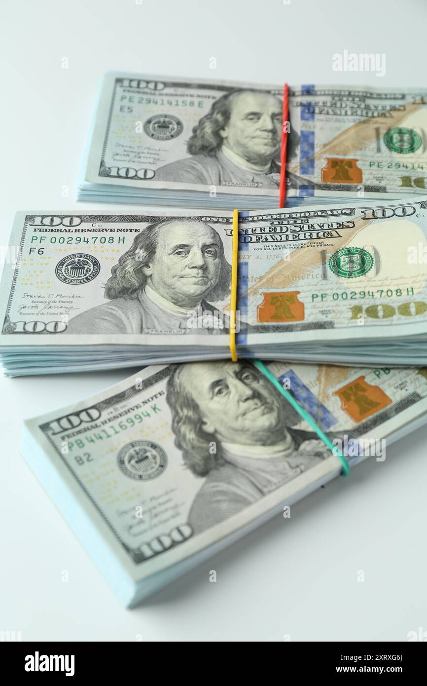 Bundles of dollar banknotes on white background Stock Photo - Alamy