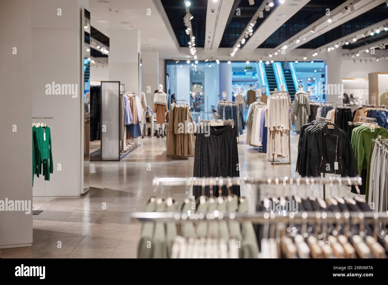 Clothing department store indoor interior in shopping mall Stock Photo ...