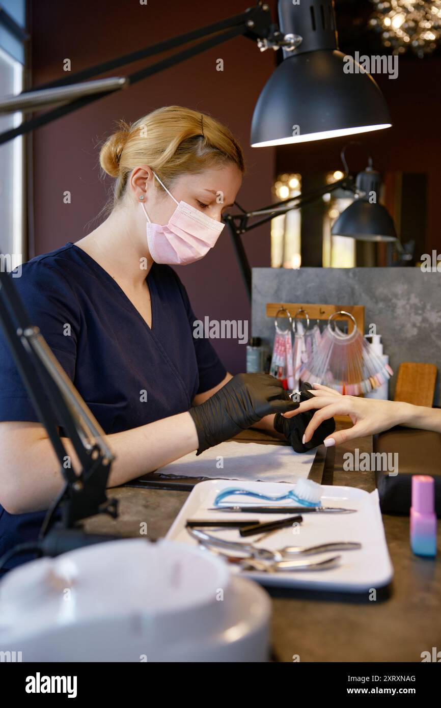 Pretty female in protective mask hi-res stock photography and images ...