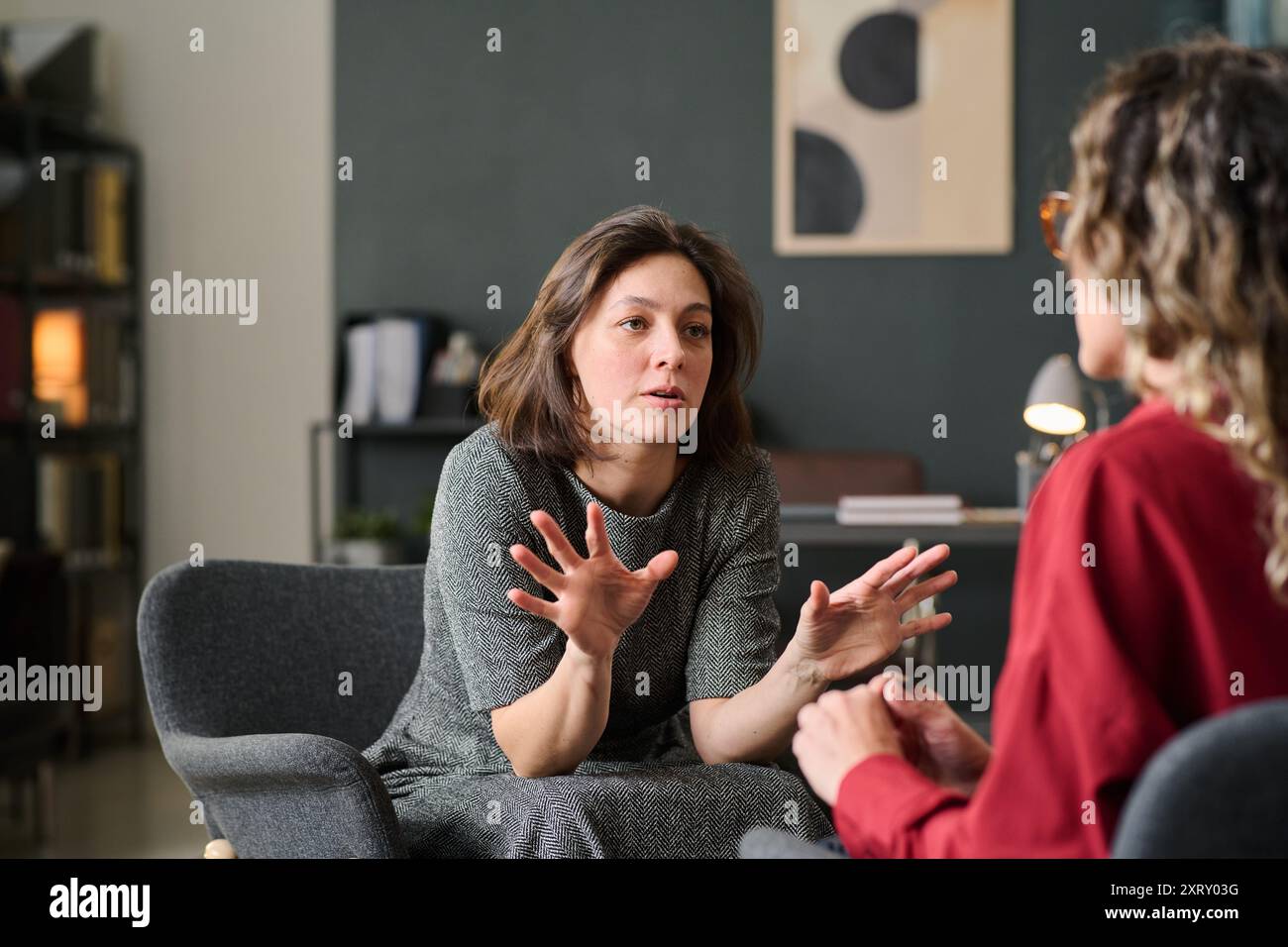 Engaging In Therapeutic Conversation During Session Stock Photo