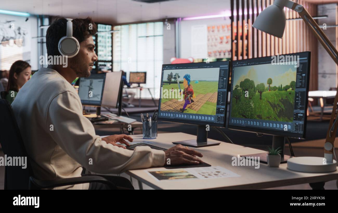 Indian Male Game Designer Using Desktop Computer With 3D modelling ...