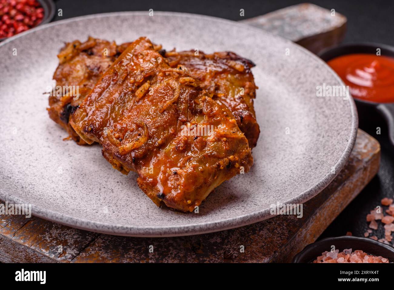 Delicious juicy grilled ribs with honey and mustard sauce with salt ...
