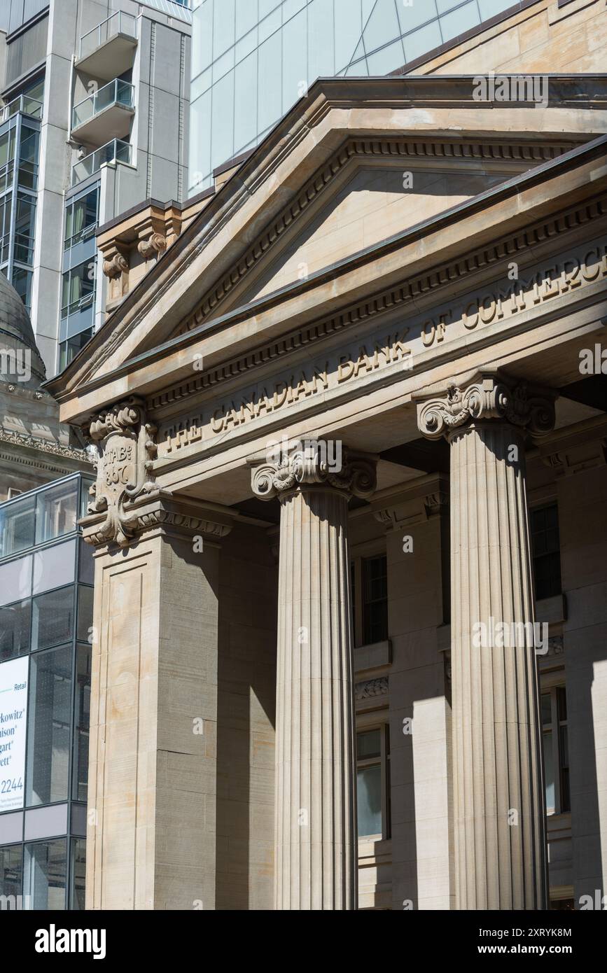 exterior facade and stone sign of 197 Yonge Street, a historic branch of Canadian Bank of Commerce (1905) in Toronto, Canada Stock Photo