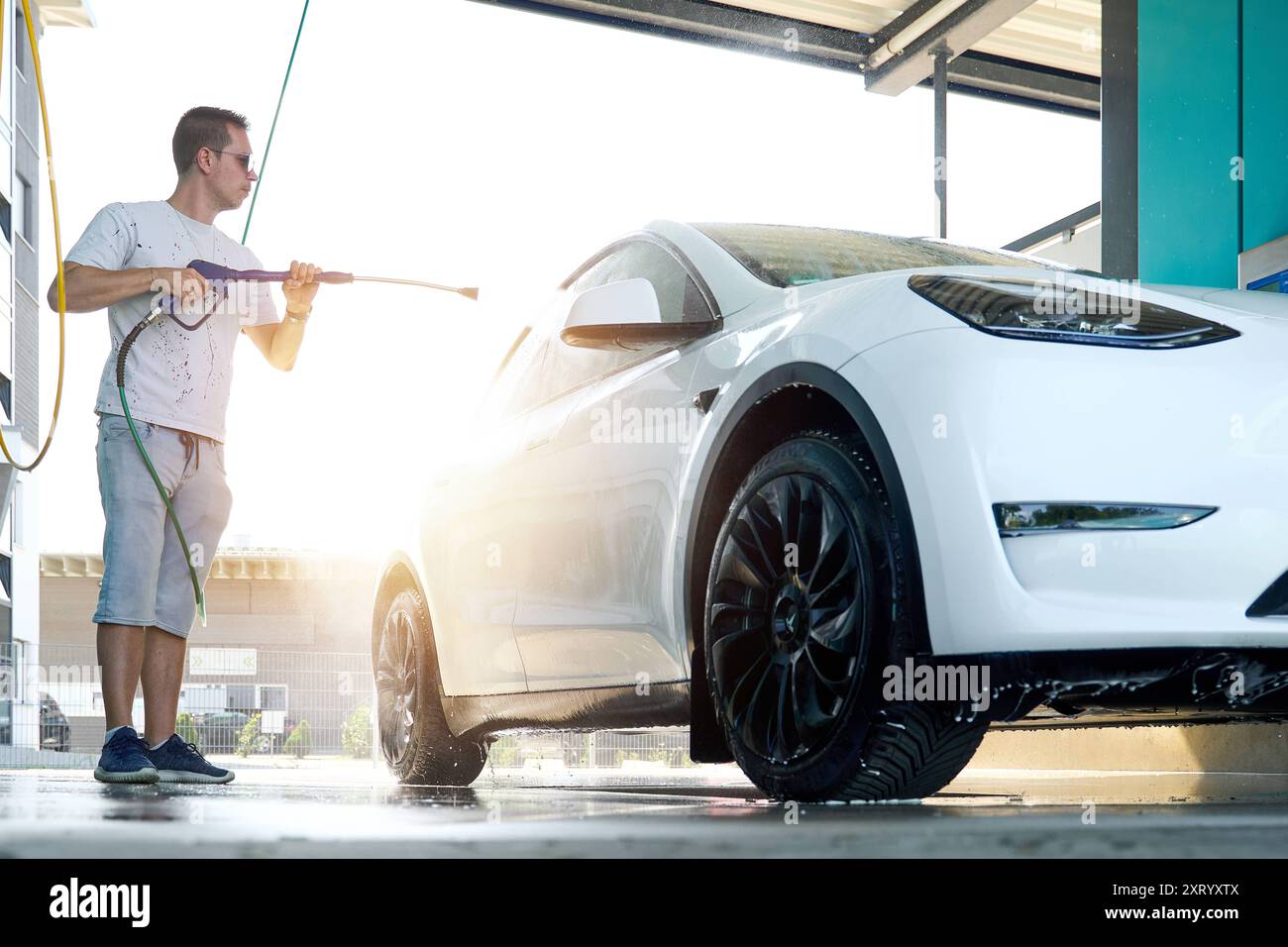 High-Quality Car Wash Tesla Model Y, Scene in HD High-Quality Car Wash Tesla Model Y, Scene in HD