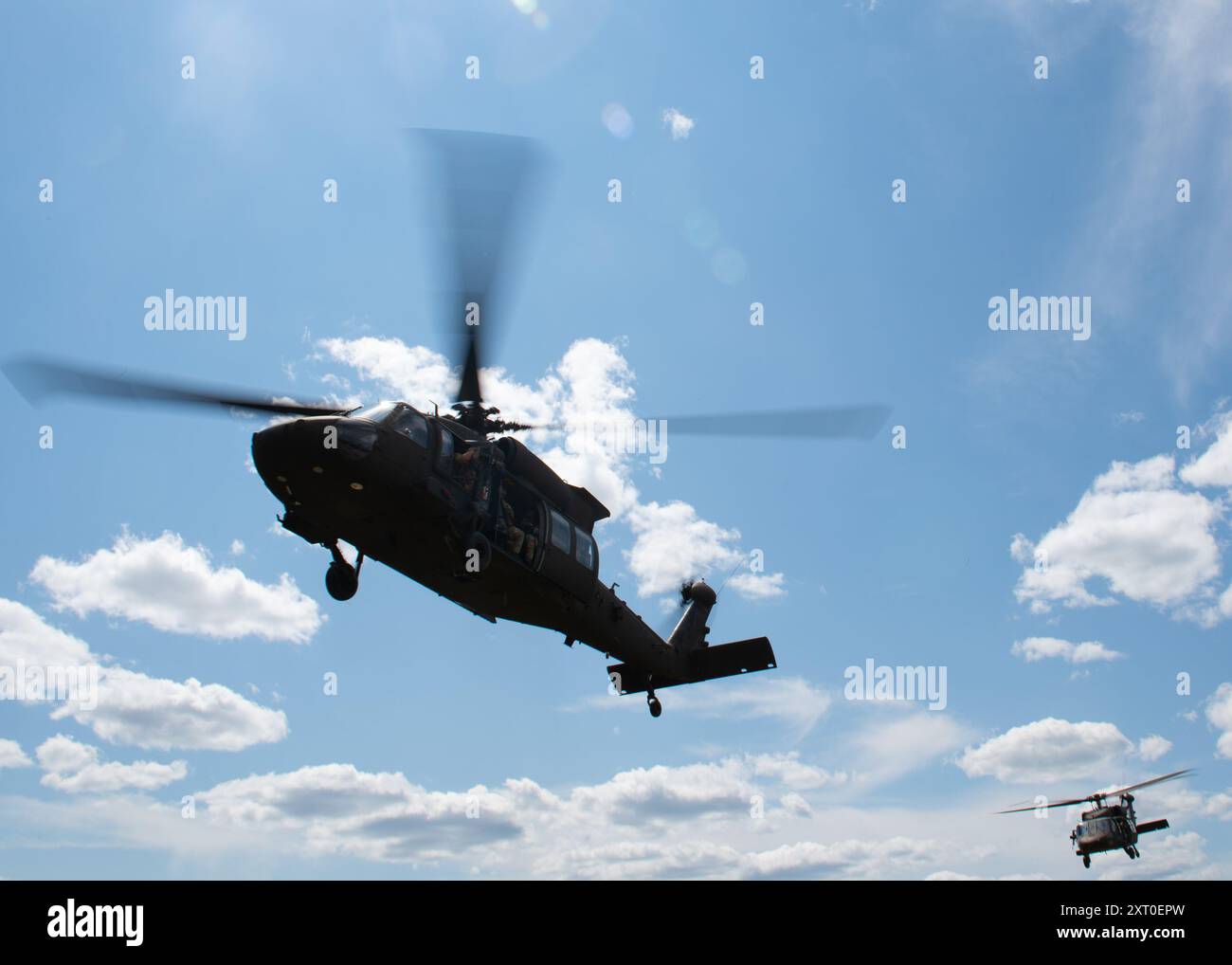 A U.S. Army 3rd Battalion, 238th Aviation Regiment General Support Aviation Battalion UH-60 Black Hawk with the Michigan National Guard takes off during Northern Strike 24-2 at Camp Grayling, Michigan, Aug. 7, 2024. Exercise Northern Strike 24-2, one of the Department of Defense's largest reserve component readiness exercises, is scheduled to take place at Michigan's National All Domain Warfighting Center (NADWC) from August 3-17, 2024. Over 6,300 participants from 32 states and territories and several international participants will converge at the NADWC. Northern Strike is the premier reserv Stock Photo