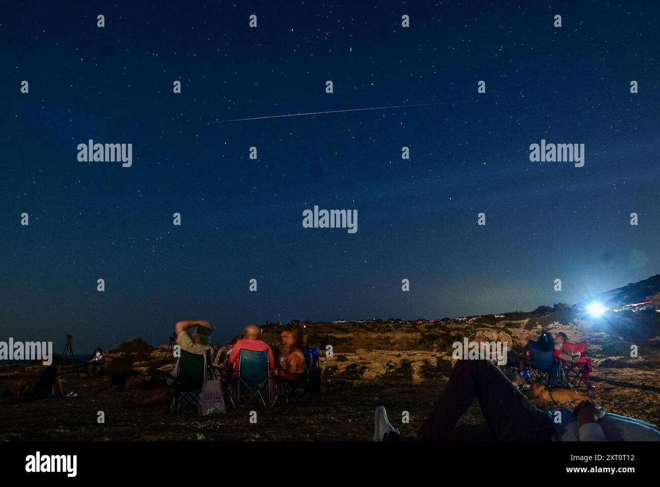 Rabat, Malta. 12th Aug, 2024. People watch Perseid meteor shower in