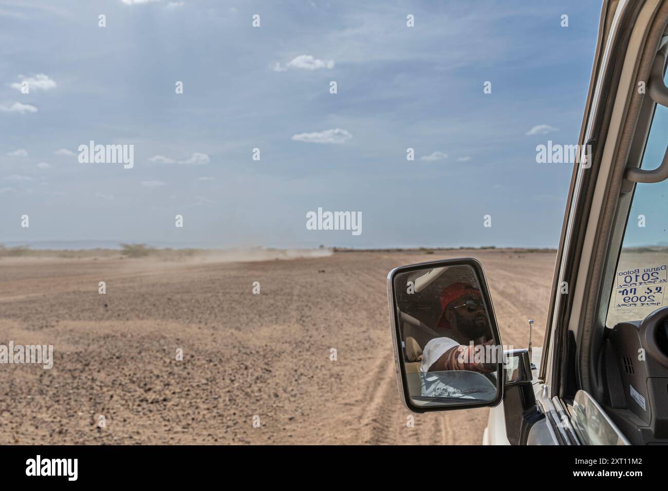 Off road in desert of Djibouti, car mirror close-up Stock Photo - Alamy