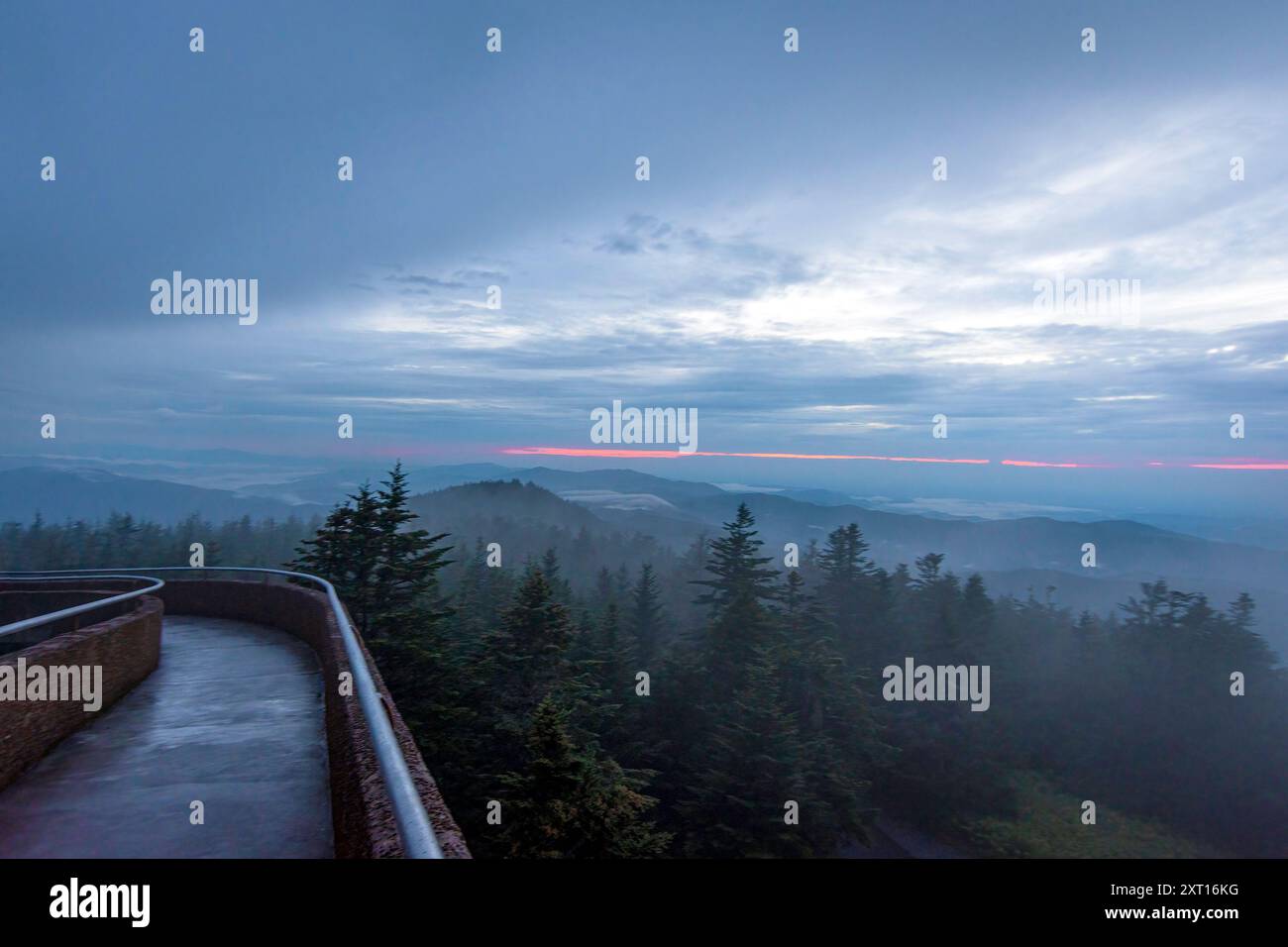 Mist enshrowed view of the mountain ranges of the Great Smoky Mountains National Park as viewed from the observation tower on Clingmans Dome (Kuwahi). Stock Photo