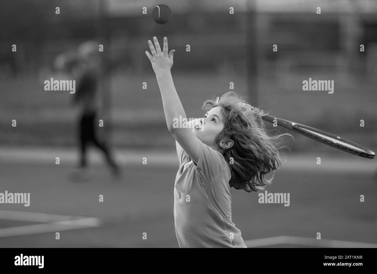 Kid play tennis. Little kid hit tennis ball with tennis racket. Active ...