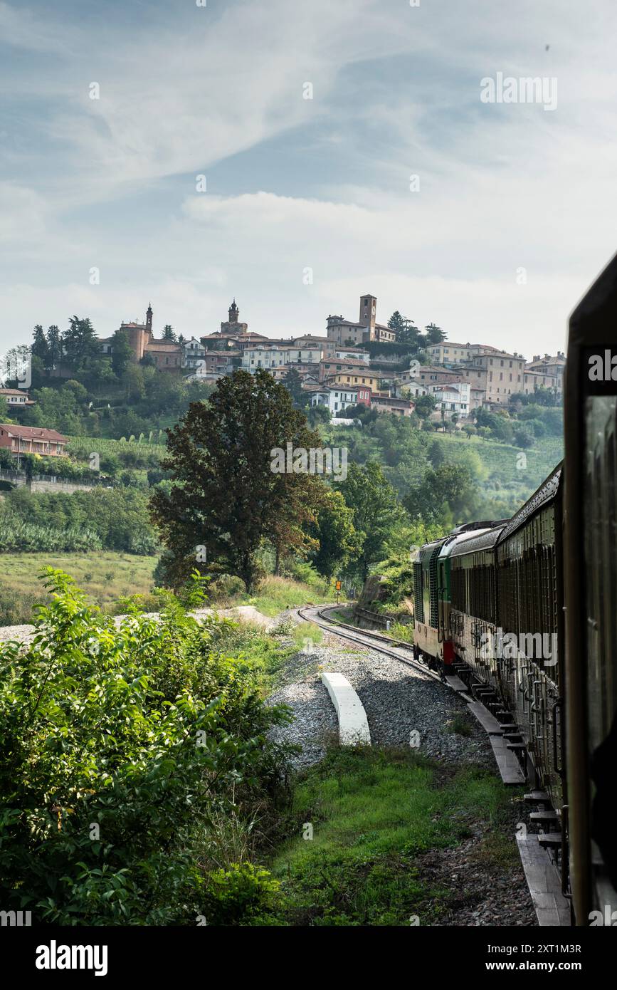 Historic vintage train journey from Torino Porta Nuova (Turin) via Alba to Canelli in the famous wine growing area of the Piedmont region in Italy. Stock Photo