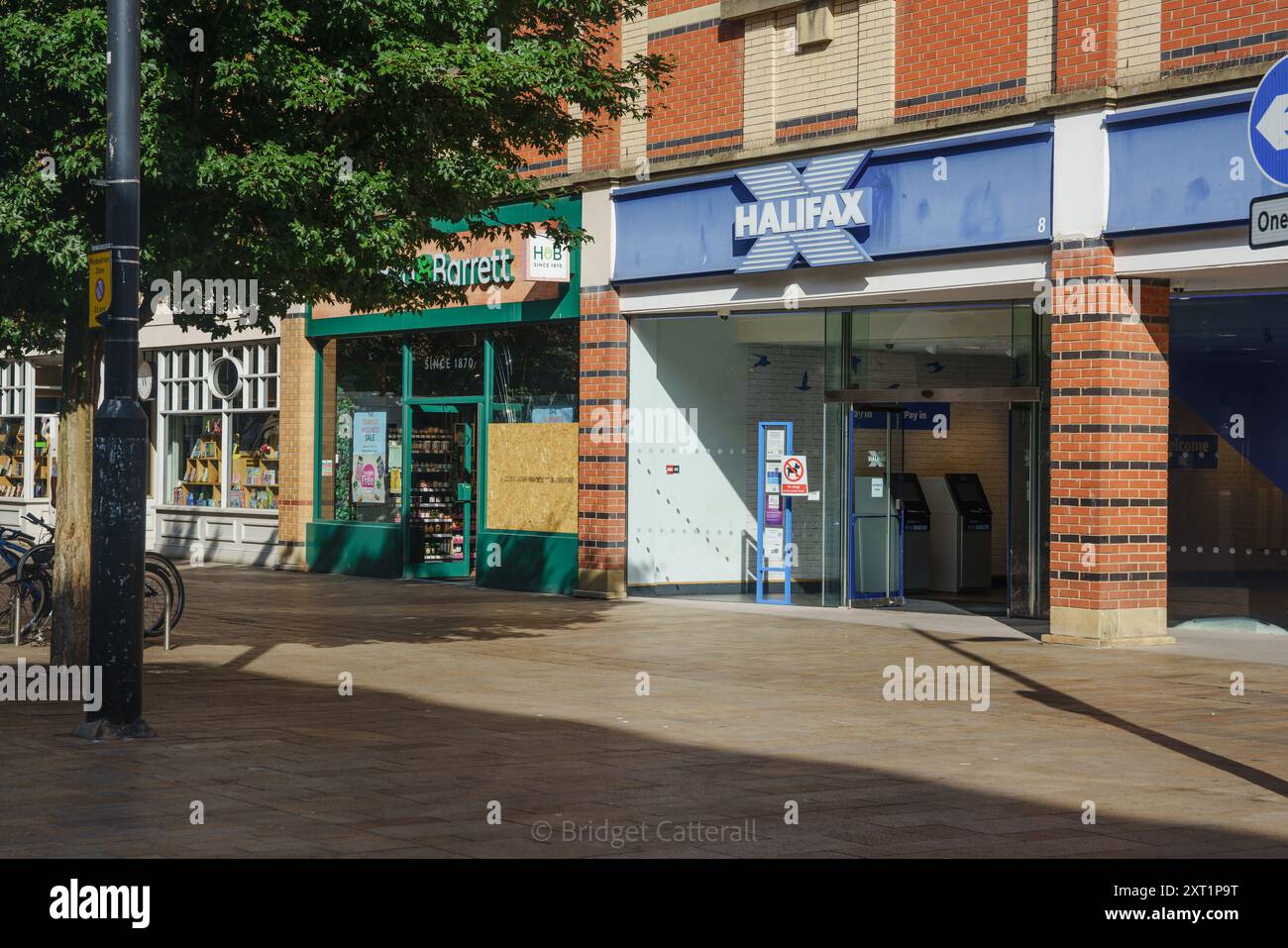 Hull, East Yorkshire, UK August 13th 2024. There have been 61 arrests with 22 charged, and three convicted on charges of violent disorder amidst riots in Hull 10 days ago. Others remain in custody, awaiting sentencing. Shops along Jameson St (directly opposite the railway station) and The Royal Hotel, believed to house refugees, had windows smashed and were looted. Shops remain boarded up. Shoezone which sustained most damage, is closed indefinitely.  Today, life carries on, with an increased police presence PICTURED: Damage to Holland and Barrett. Bridget Catterall AlamyL Stock Photo