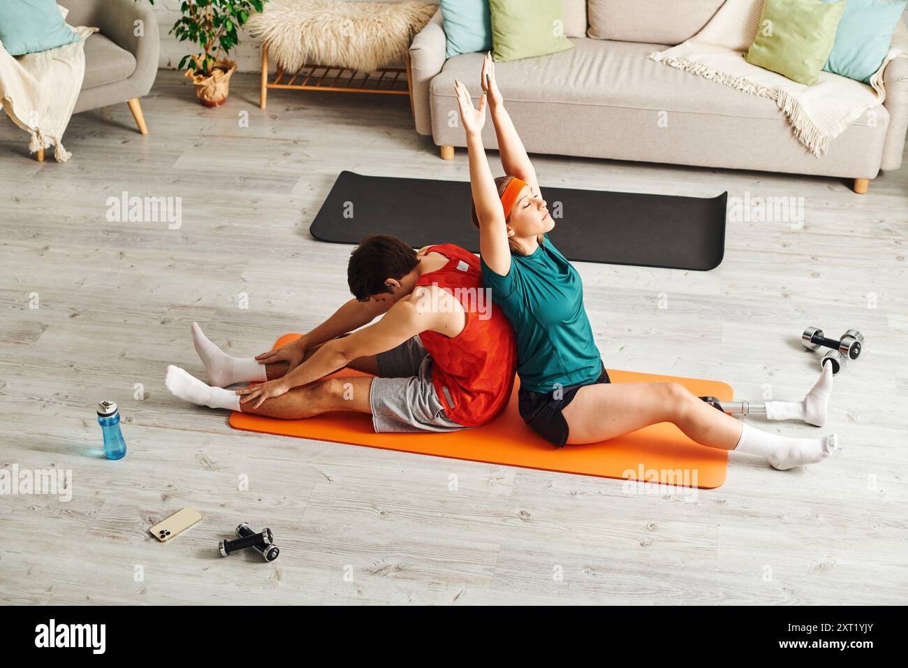Man stretching leg on floor hi-res stock photography and images - Alamy