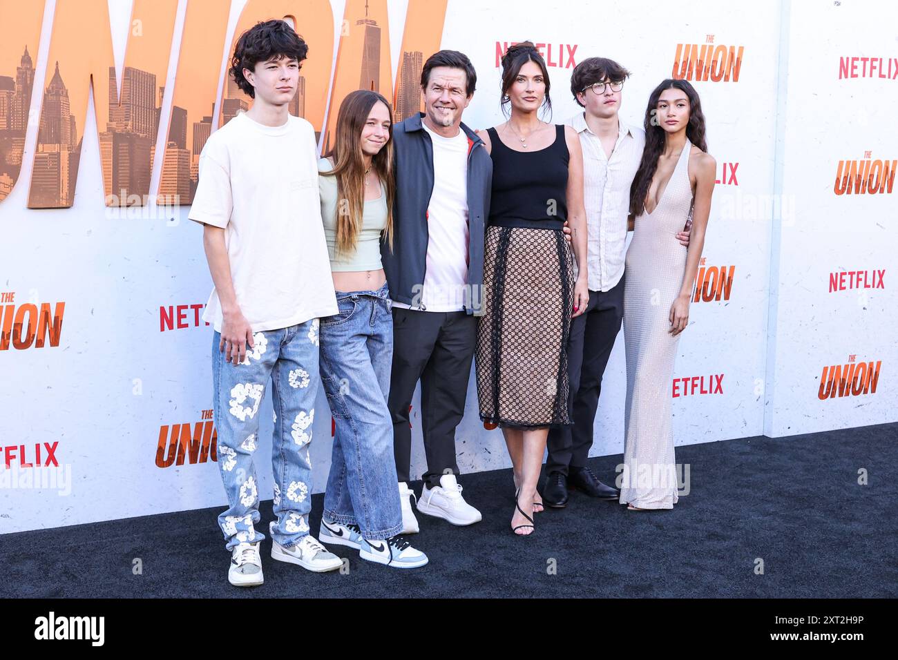 Hollywood, United States. 12th Aug, 2024. HOLLYWOOD, LOS ANGELES, CALIFORNIA, USA - AUGUST 12: Mark Wahlberg, wife Rhea Durham, son Michael Wahlberg and Sunni Gaines arrive at the Los Angeles Premiere Of Netflix's 'The Union' held at The Egyptian Theatre Hollywood on August 12, 2024 in Hollywood, Los Angeles, California, United States. (Photo by Xavier Collin/Image Press Agency) Credit: Image Press Agency/Alamy Live News Stock Photo