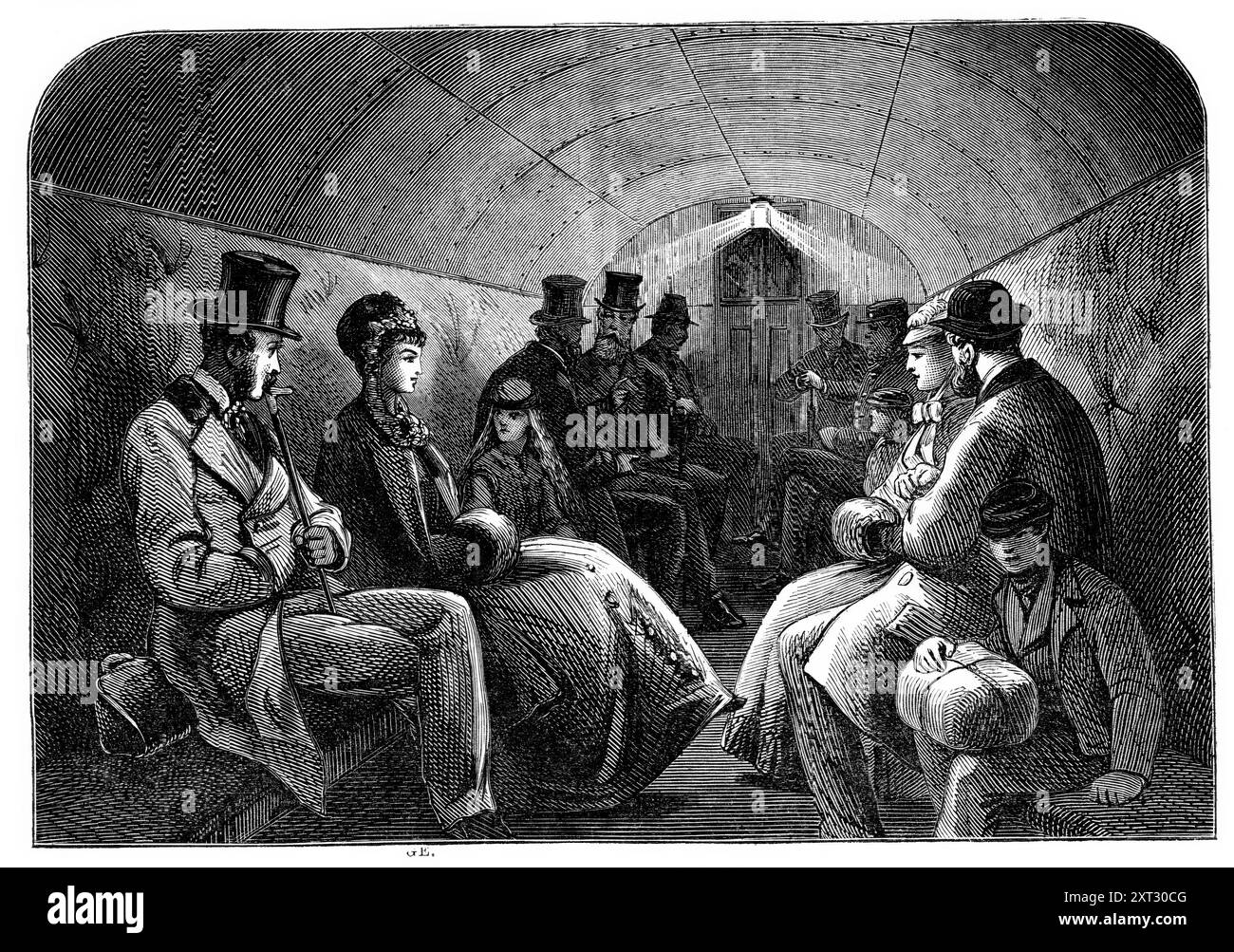 The Thames Subway at Tower-Hill: interior of carriage, 1870. Tunnel under the River Thames in London, designed by William Henry Barlow. 'The subway consists of a narrow tunnel uniting two vertical shafts, the mouth of one being on Tower-hill and the other in Vine-street, Tooley-street...The tunnel is lined with iron tubing...This tube is 7 ft. in clear internal diameter...and carries a railway of 2 ft. 6 in. gauge. On the railway runs an omnibus conveying twelve passengers...The omnibus is of iron - light, but very strong, and runs upon eight wheels. It is connected with a rope of steel wire b Stock Photo