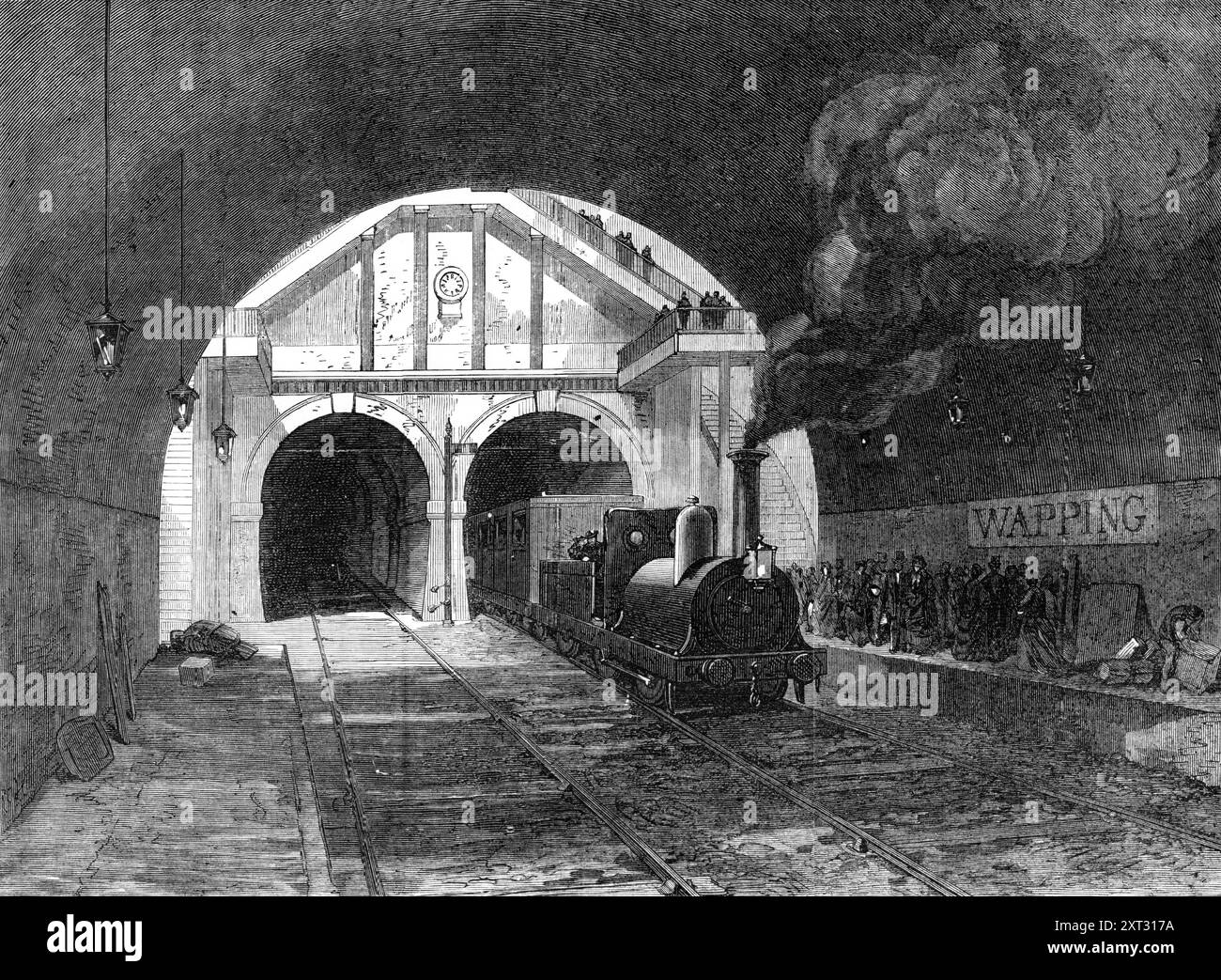 Railway through the Thames Tunnel, 1870. 'The first section of the East London Railway, extending from New-cross to Wapping - another link in the great outer circle of communication which will eventually surround the metropolis, and which, even in its incomplete condition, will be an important means of transit between the north and south sides of the Thames - was opened on the 7th December...All the works have been constructed by Messrs. Lucas and Wise, contractors, under the direction of Mr. Benjamin Burleigh, the acting engineer, according to the plans of Mr. Hawkshaw, the engineer of the li Stock Photo