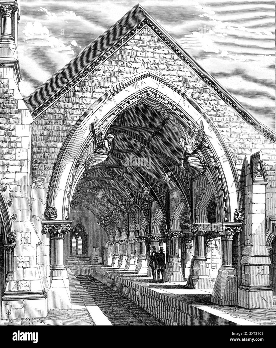 Receiving-House of the Redfern Cemetery, near Sydney, 1870. 'The branch railway station of the Redfern Cemetery, where the funeral trains come in to deposit their charges, is a handsome Gothic building, designed, as well as the mortuary chapel, by Mr. James Barnett, colonial architect, of New South Wales. It comprises a waiting-room and ladies' retiring-room, with lavatories and other conveniences. The entrance-arch, supported on pillars with carved capitals, will be adorned with sculptured figures of the Angel of Death and the Angel of the Resurrection. modelled by the late Mr. Thomas Duckett Stock Photo