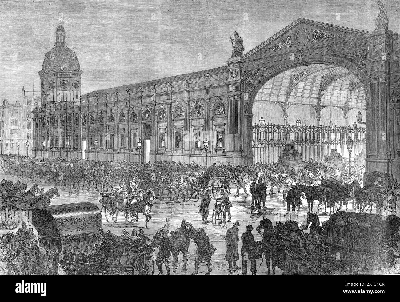 The Meat Market, Smithfield, [London], at two in the morning, 1870. 'Hours before daylight, the New Smithfield Market is a scene of busy traffic...The supply is kept up by the dead-meat trains, which arrive during the night on most of the leading railway lines. There is very little repose about the market. Meat-vans are driving up to its gates, or returning to the butchers, with carcasses piled high upon them...The noisy shouts, the glimmering gaslights, the flambeaux, if the morning is foggy, the barking of dogs, the endless chaff, the bustle of the whole scene, cannot be realised by those wh Stock Photo