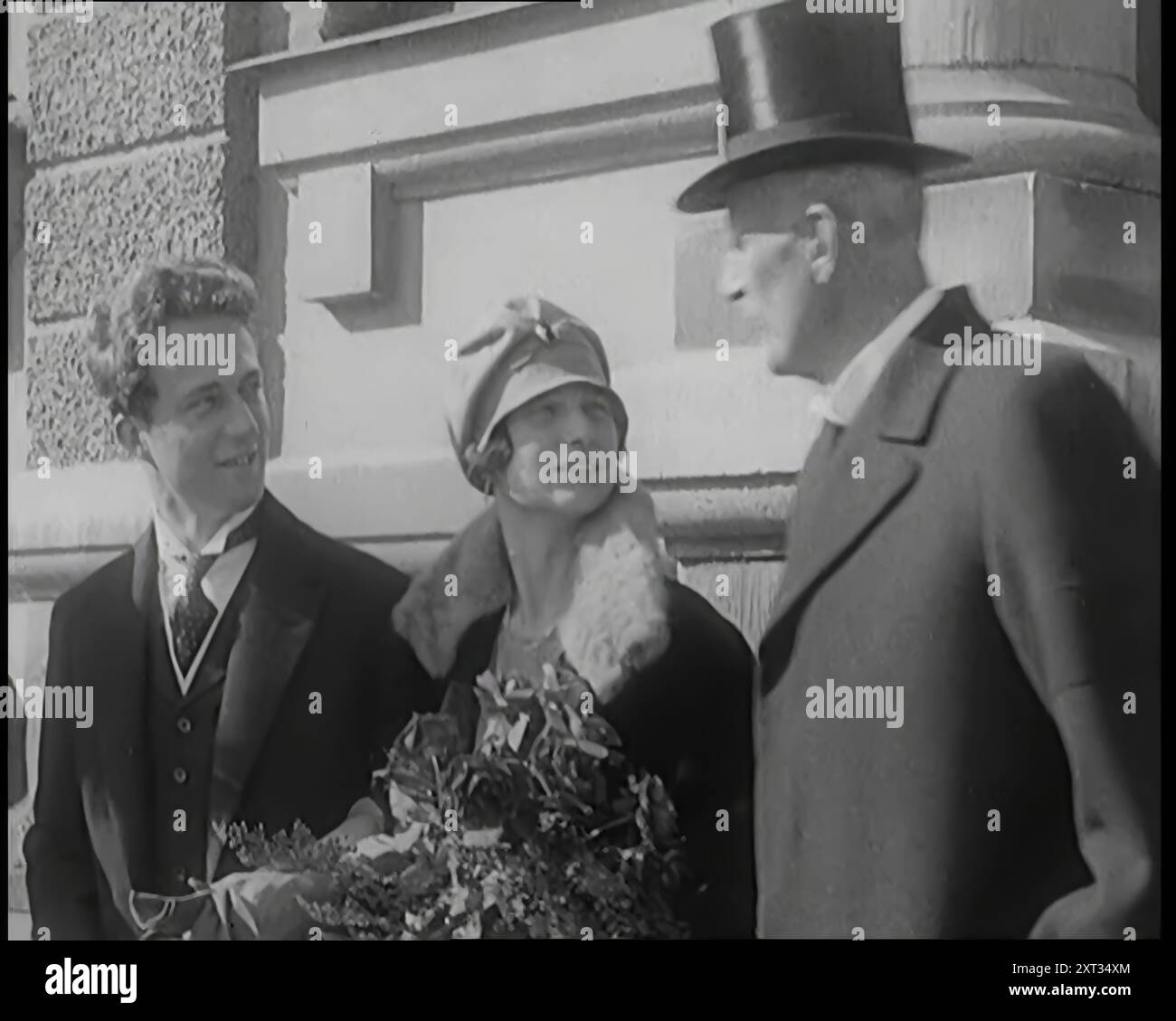 Crown Prince Leopold of Belgium and Princess Astrid of Sweden Walking With Her Parents Prince Carl of Sweden and Norway and Princess Ingeborg of Denmark and Princess Ingeborg of Denmark, 1926. From &quot;Time To Remember 1926 - Short Sharp Shower&quot; ( Reel 3); documentary about 1926 - General Strike, international politics, dancing, weather and record breaking feats. Stock Photo