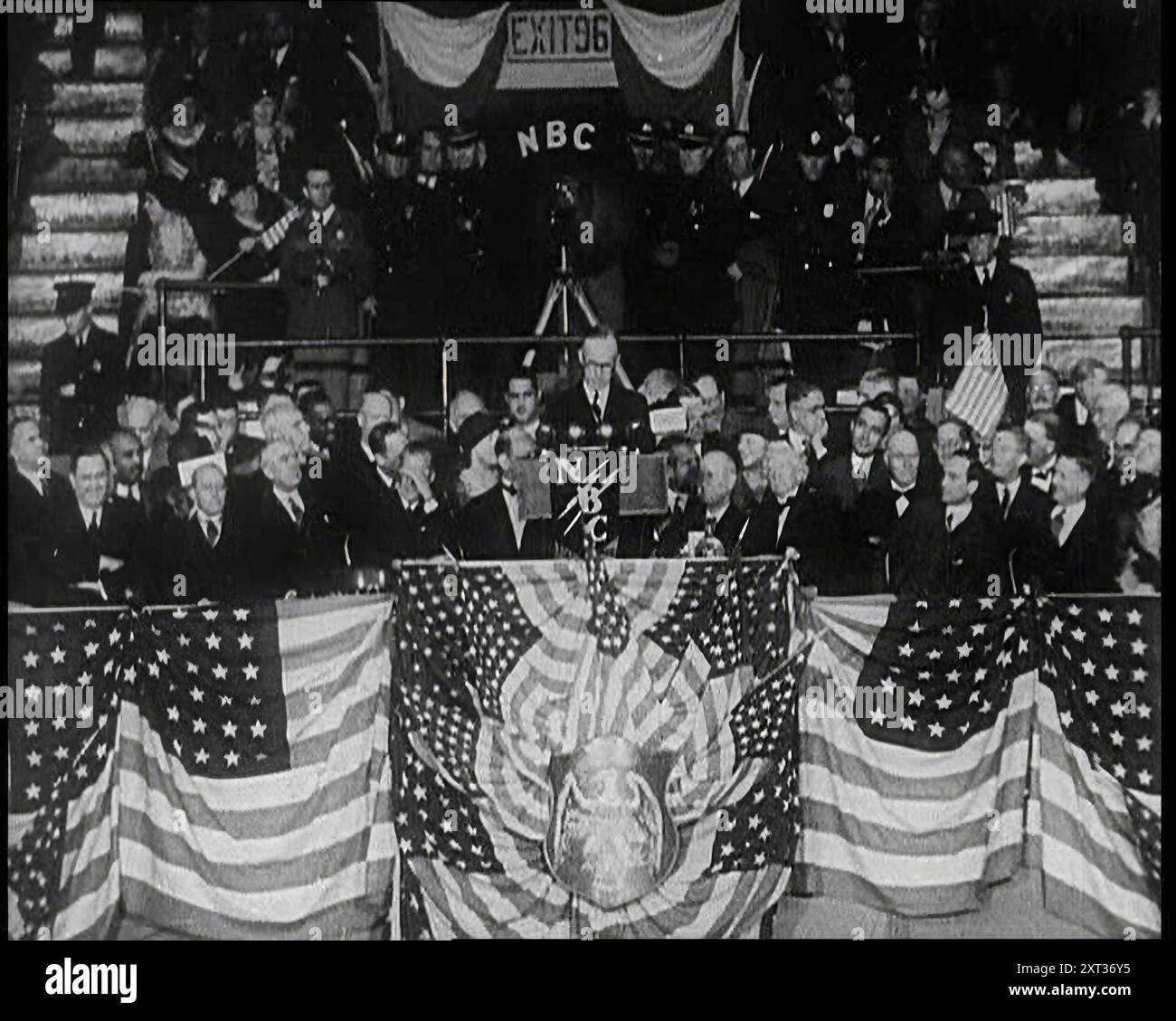 Former President Calvin Coolidge Addressing the Crowd at the Republican Congress in Chicago, 1932. 'In spite of everything, the election of 1932 found the Republicans sure of keeping their power. At the party's convention at Chicago, the delegates listened to ex-president Coolidge, when he expressed himself fully in favour of a return of Herbert Hoover. The bad times were the fault not of government but of world depression. The party must continue to hold the reins, and Herbert Hoover must be the man in the driver's seat. The maxim that Hoover respected was that of an America of business witho Stock Photo