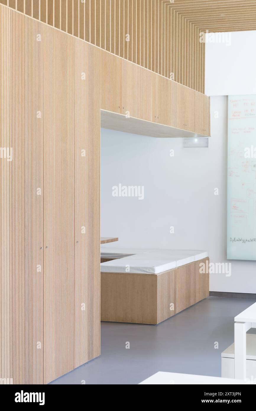 A contemporary minimalist interior featuring clean lines, wooden ...