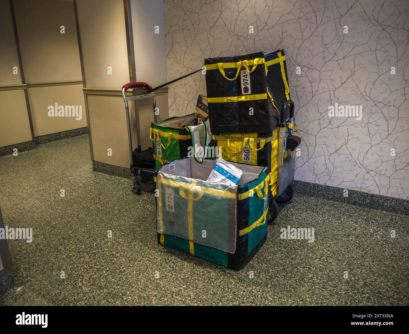 Ny Package Program Bags laden with Amazon packages sit unattended in an apartment building ...