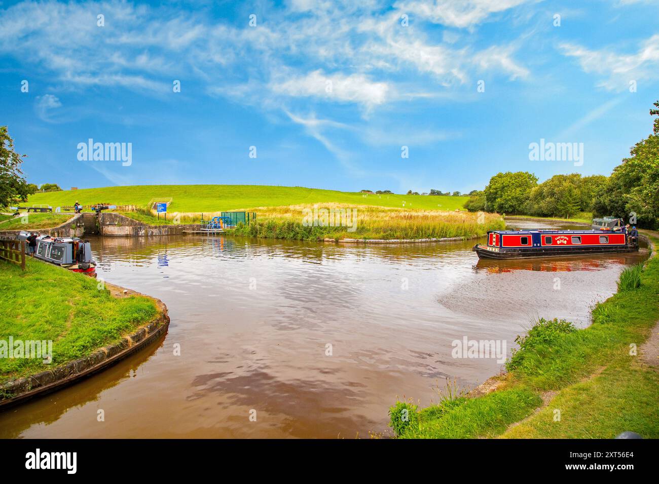 Canal narrowboat about to leave the Shropshire union canal at Hurleston junction near Nantwich Cheshire to join the Llangollen canal Stock Photo