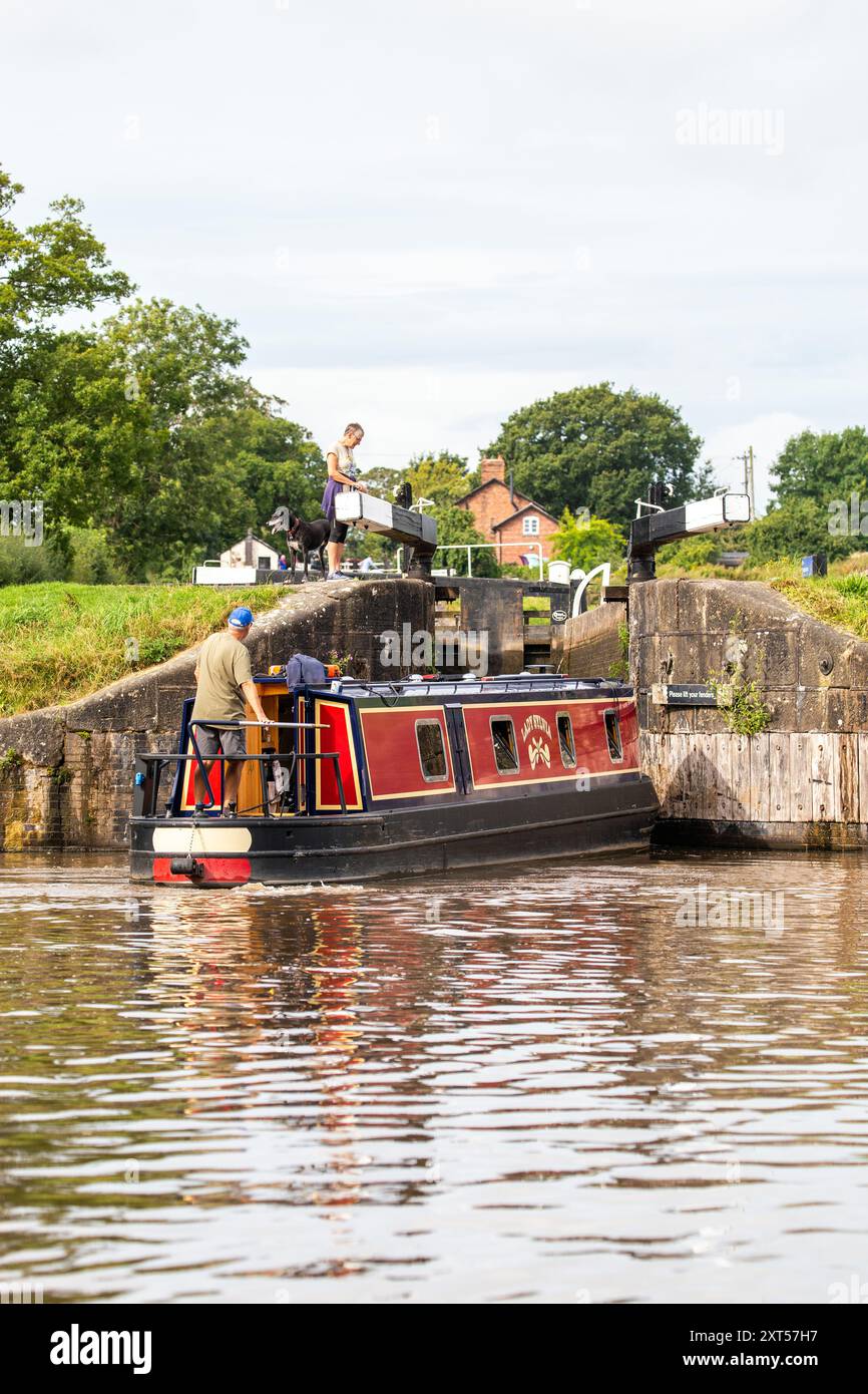 Canal narrowboat about to enter the Llangollen canal at Hurleston  junction bottom lock no1 after leaving the Shropshire union canal Cheshire Stock Photo