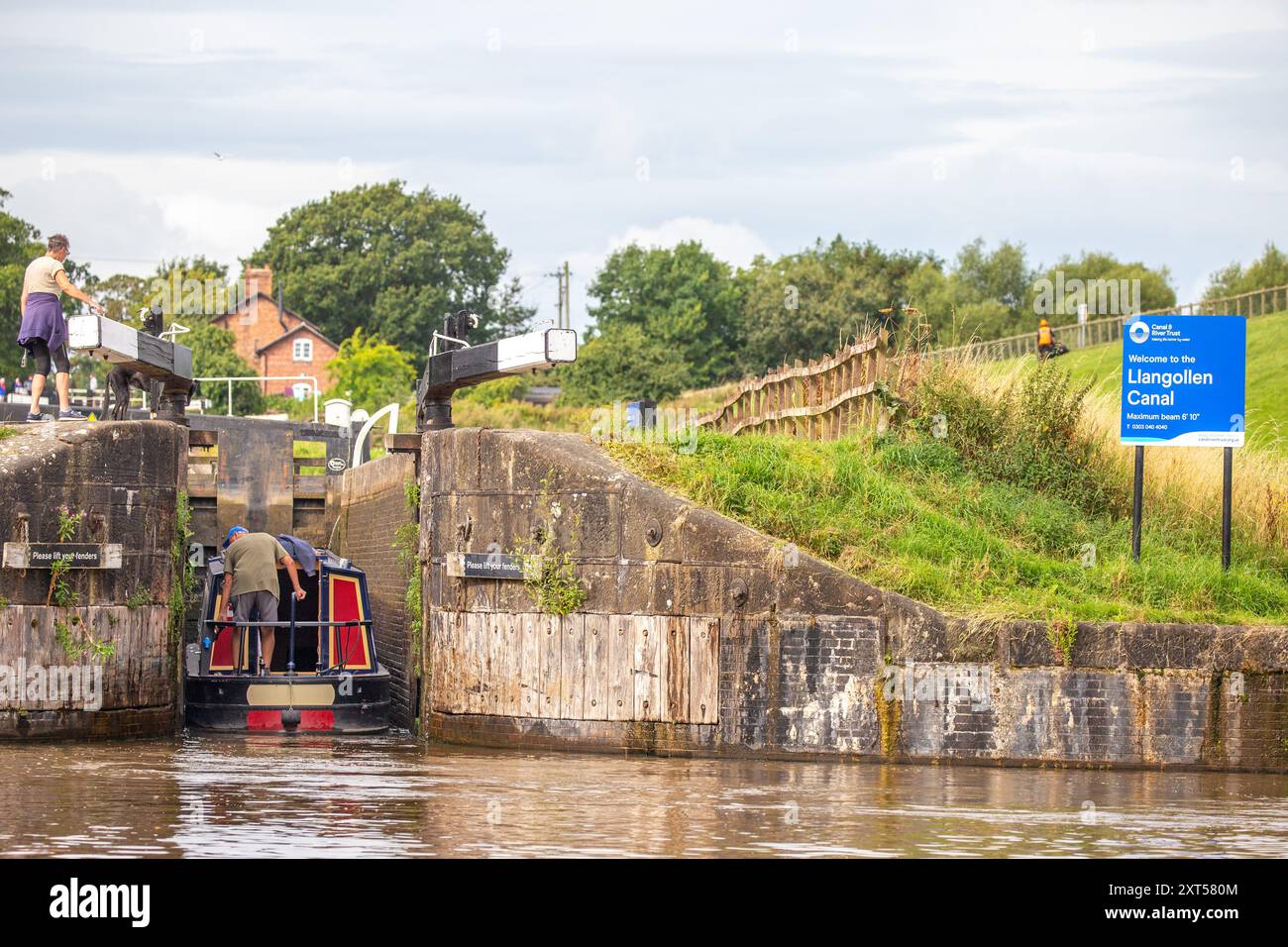 Canal narrowboat about to enter the Llangollen canal at Hurleston  junction bottom lock no1 after leaving the Shropshire union canal Cheshire Stock Photo