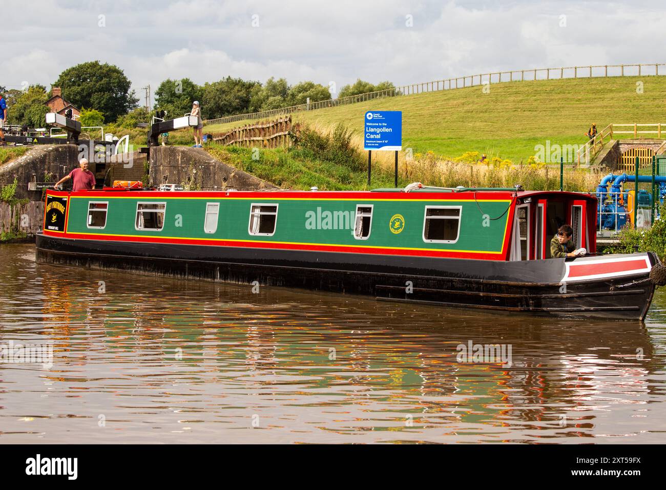 Canal narrowboat about to leave the Llangollen canal at Hurleston junction bottom lock no1 to join the Shropshire union canal Cheshire Stock Photo