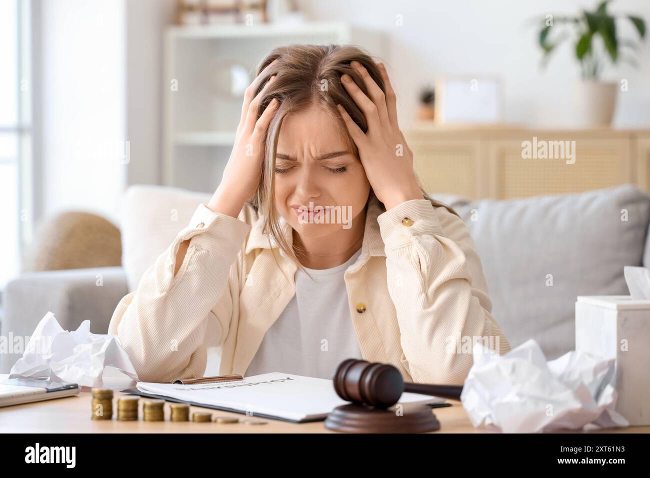 Portrait of bankrupt young woman at home Stock Photo Alamy