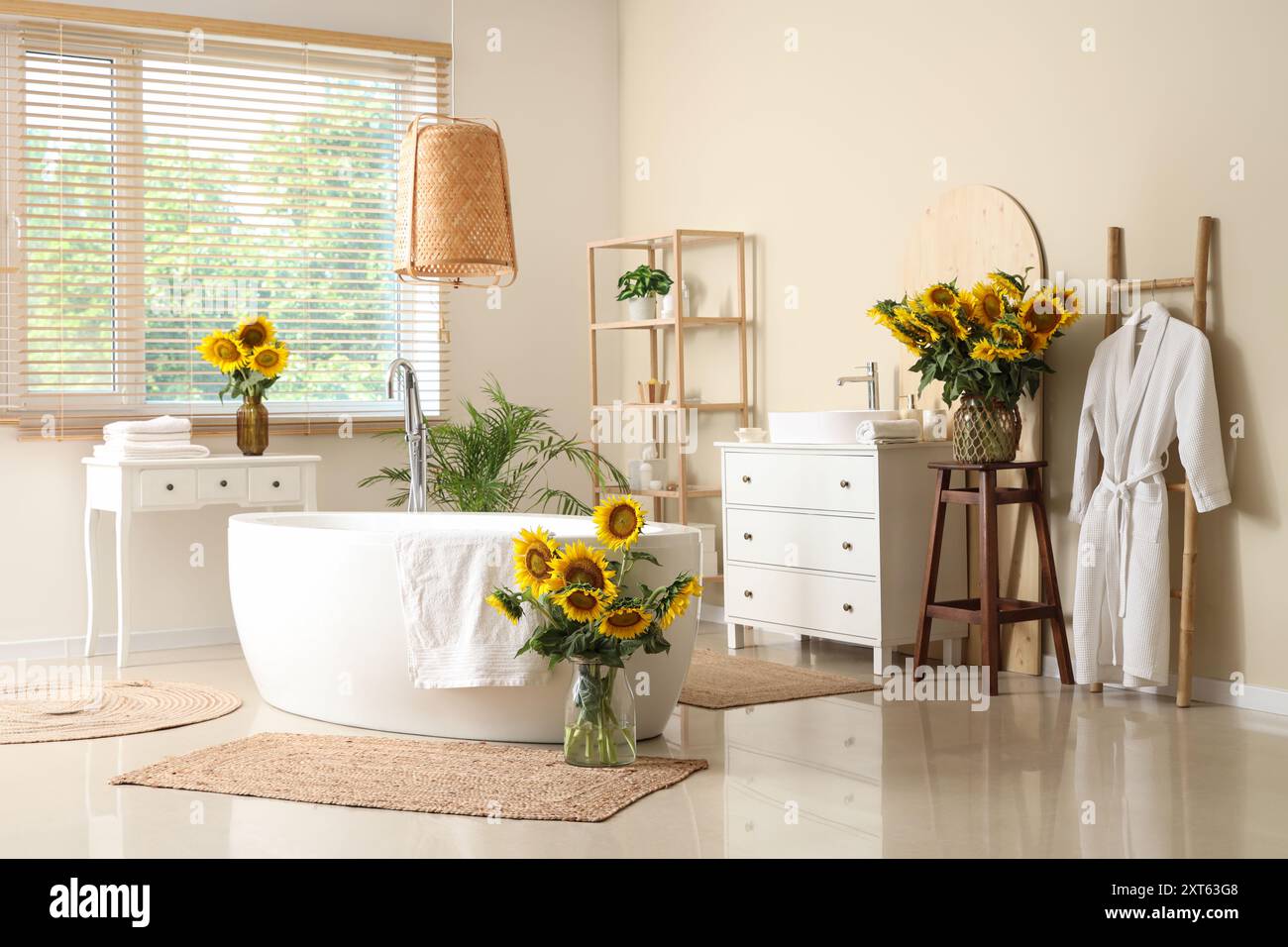 Interior of bathroom with sunflowers in vases Stock Photo - Alamy