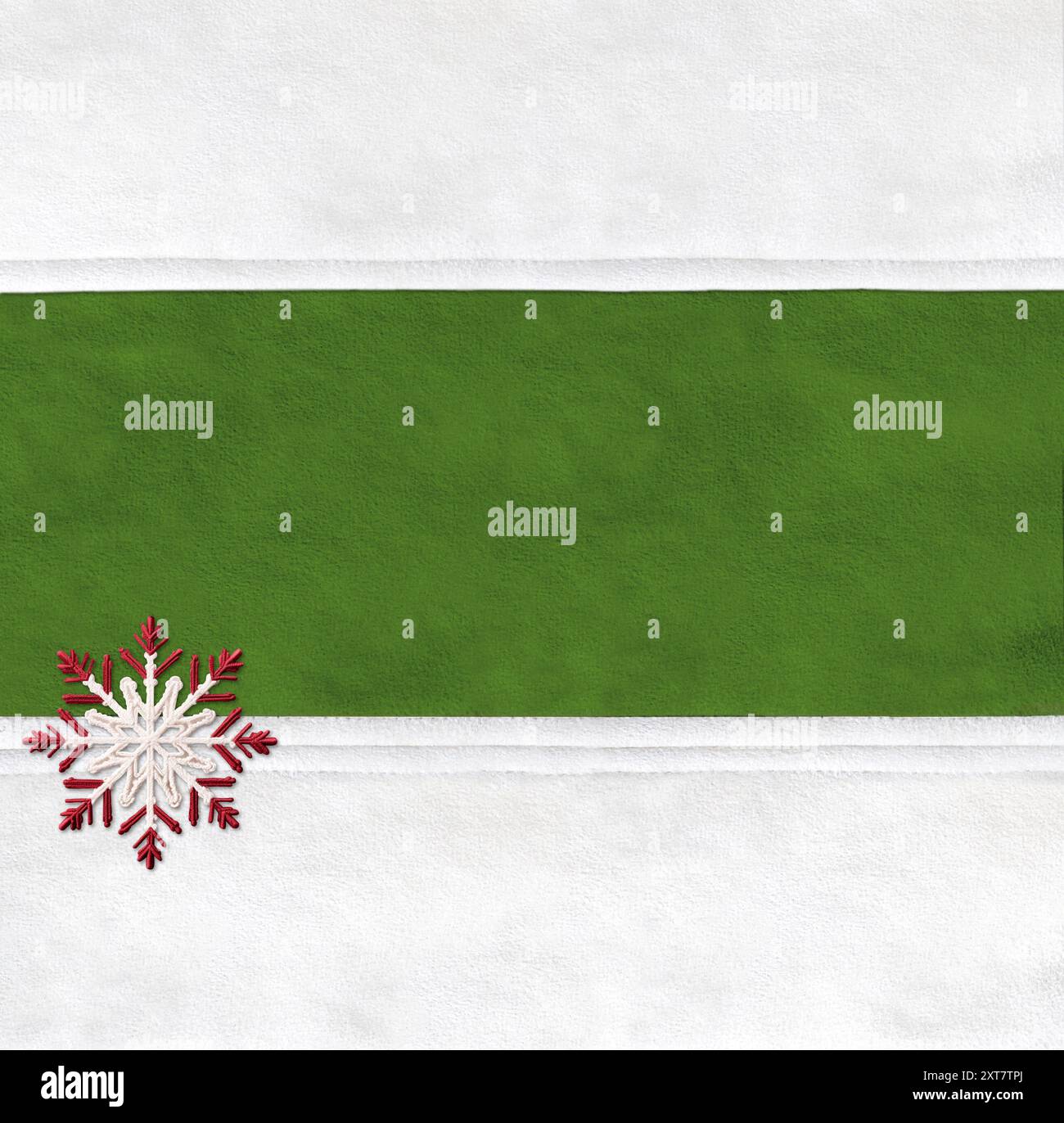 Christmas background with suede texture of green and white color and felt snowflake. Background for scrapbooking design, decoration with suede leather Stock Photo