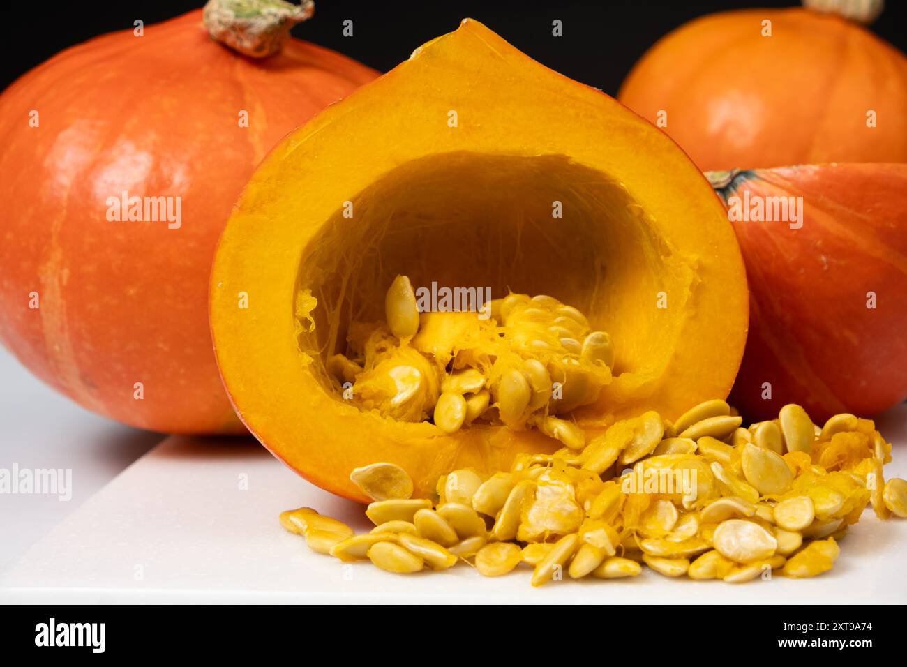 hokkaido-pumpkin-seed-extraction-pumpkin-inside-with-raw-seeds-stock