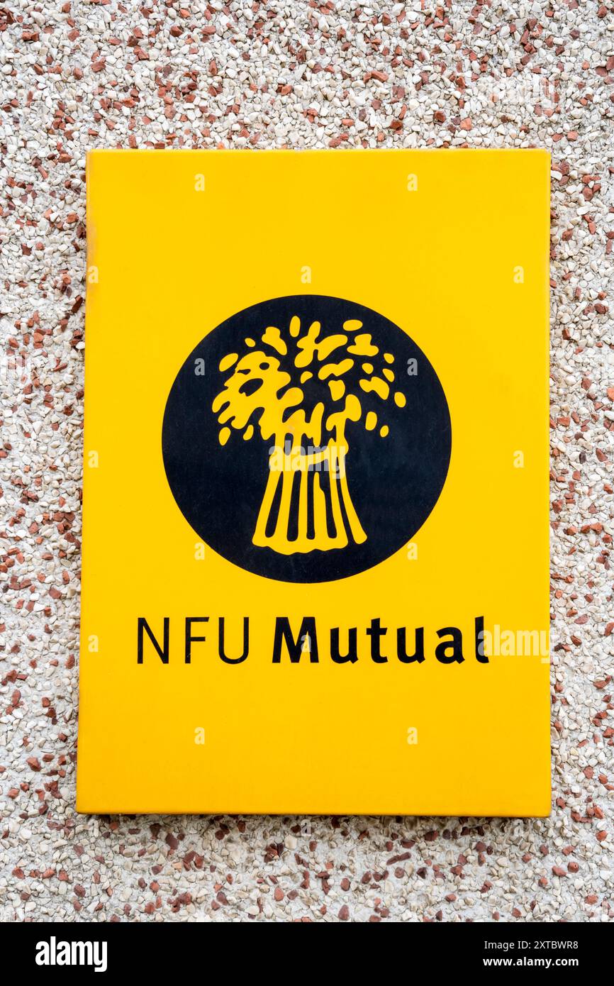 The logo of the NFU Mutual insurance company attached to a building. Stock Photo