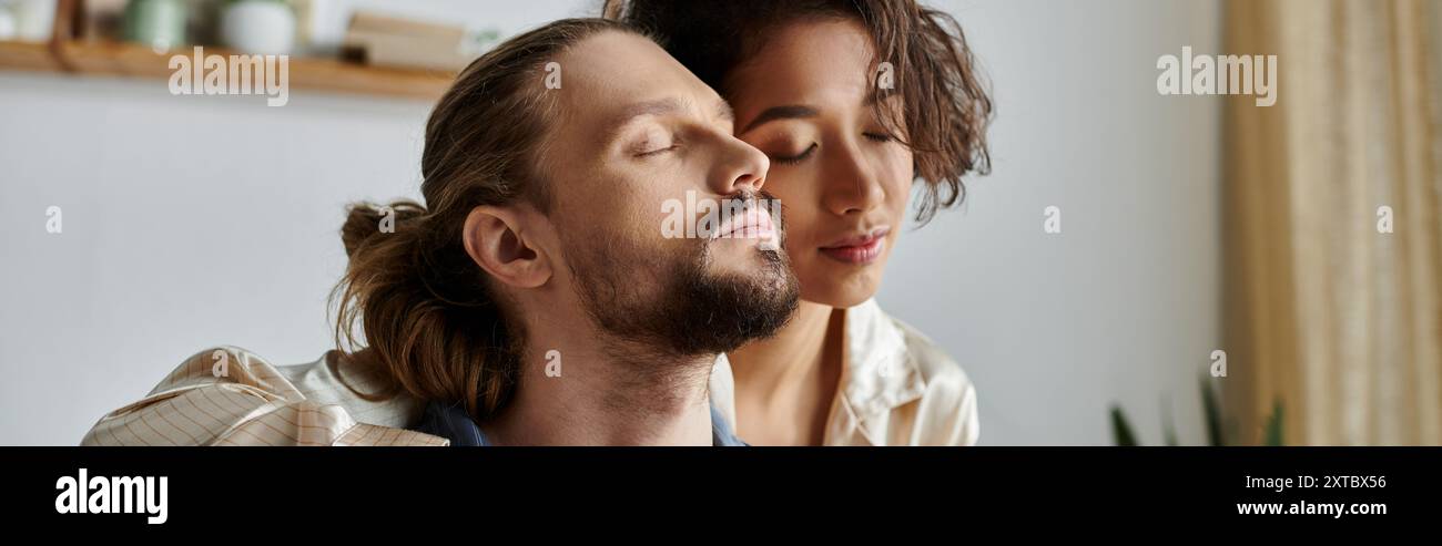 Lovingly Couple embraces lovingly home hi-res stock photography and images - Alamy