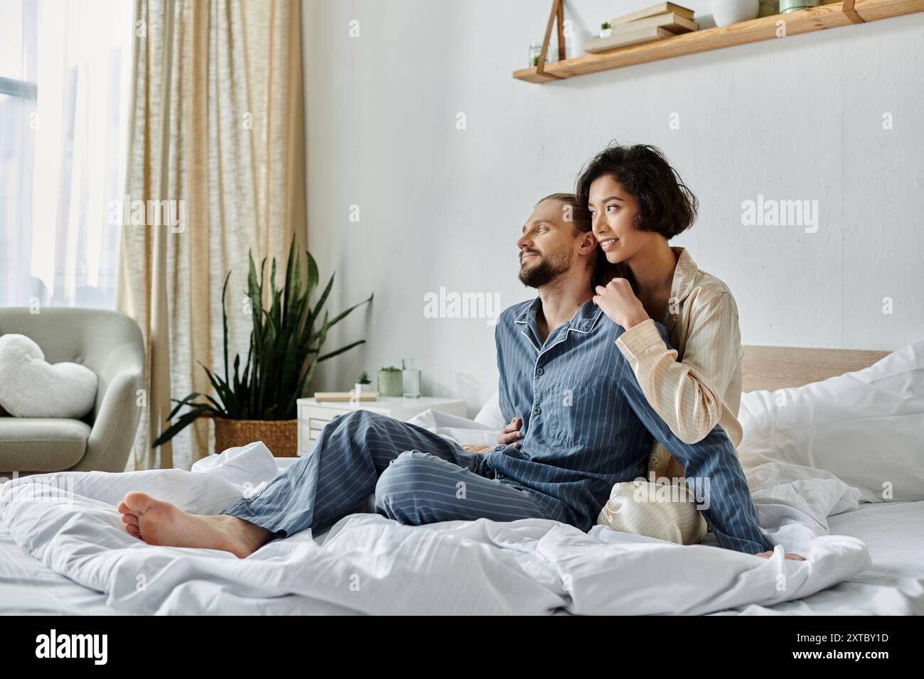 A loving couple in pajamas relaxes