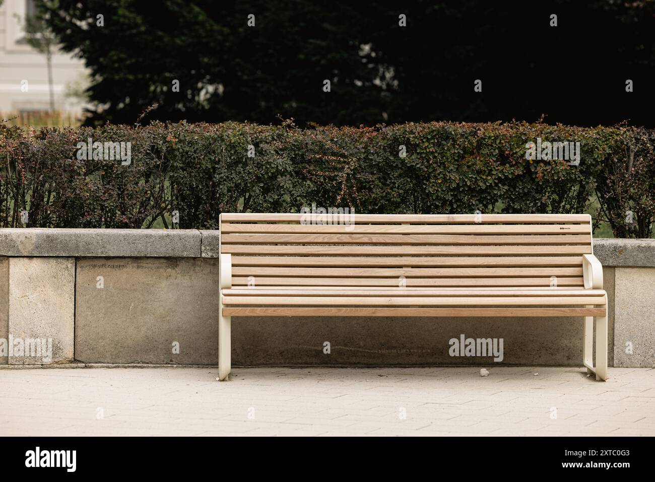 Modern benches in the city square on a sunny day. City improvement ...