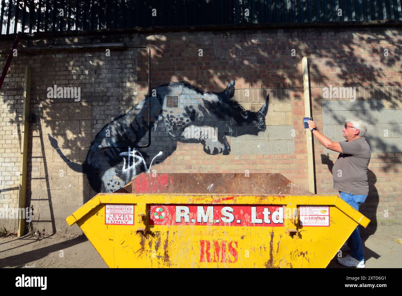 London, UK. 13th Aug, 2024. Banksy reveals Rhino as eighth artwork in