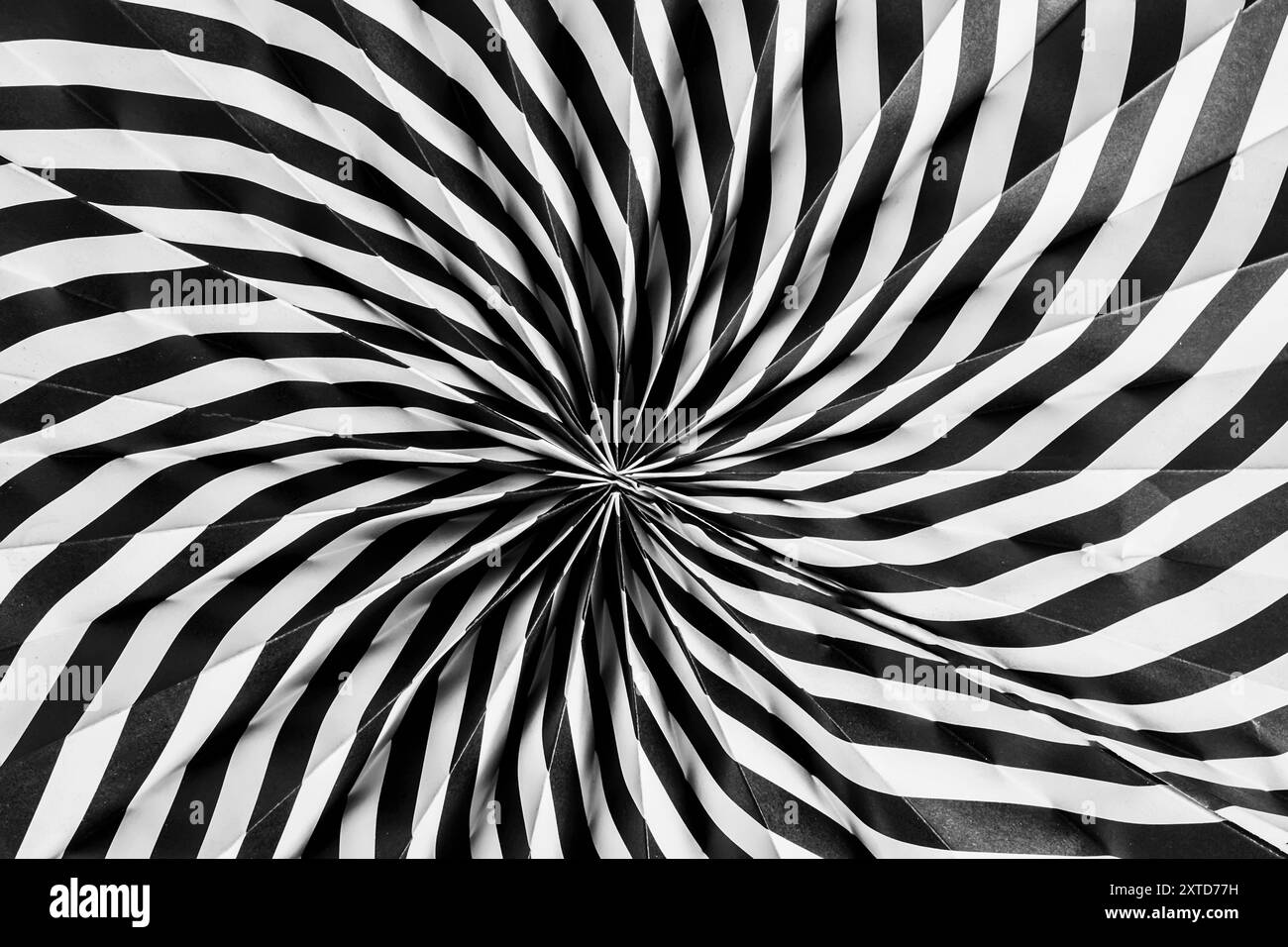 Abstract black and white spiral pattern creating hypnotic visual effect ...