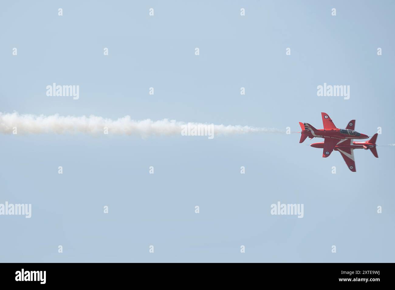 2 of The RAF Red Arrows crossing each other at Blackpool Air Show