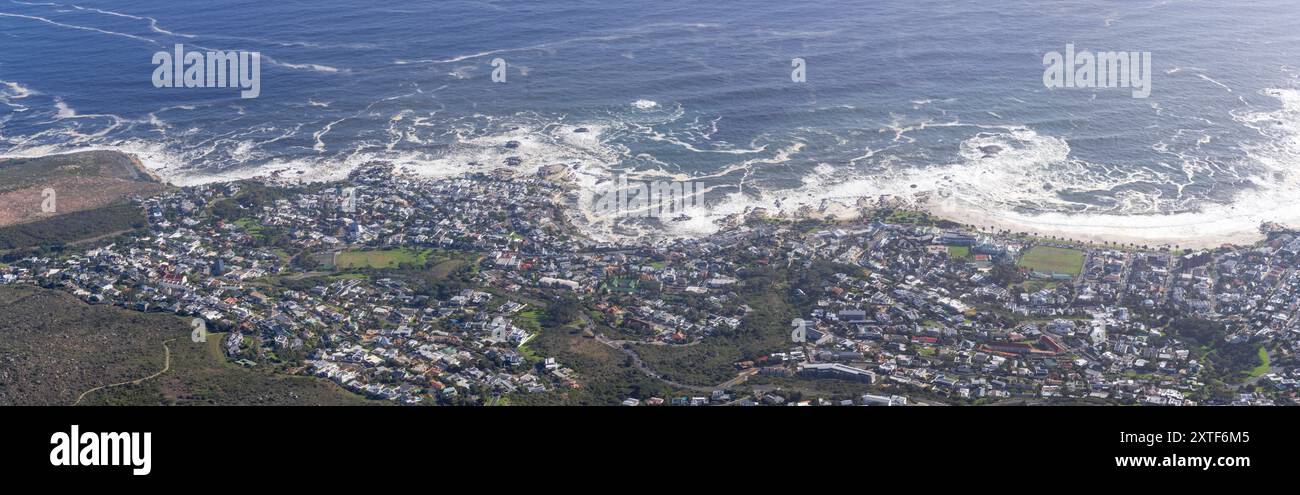 Panoramic view of Bakoven and Camps Bay from the top of Table Mountain, Cape Town, South Africa on a beautiful winter morning. Stock Photo