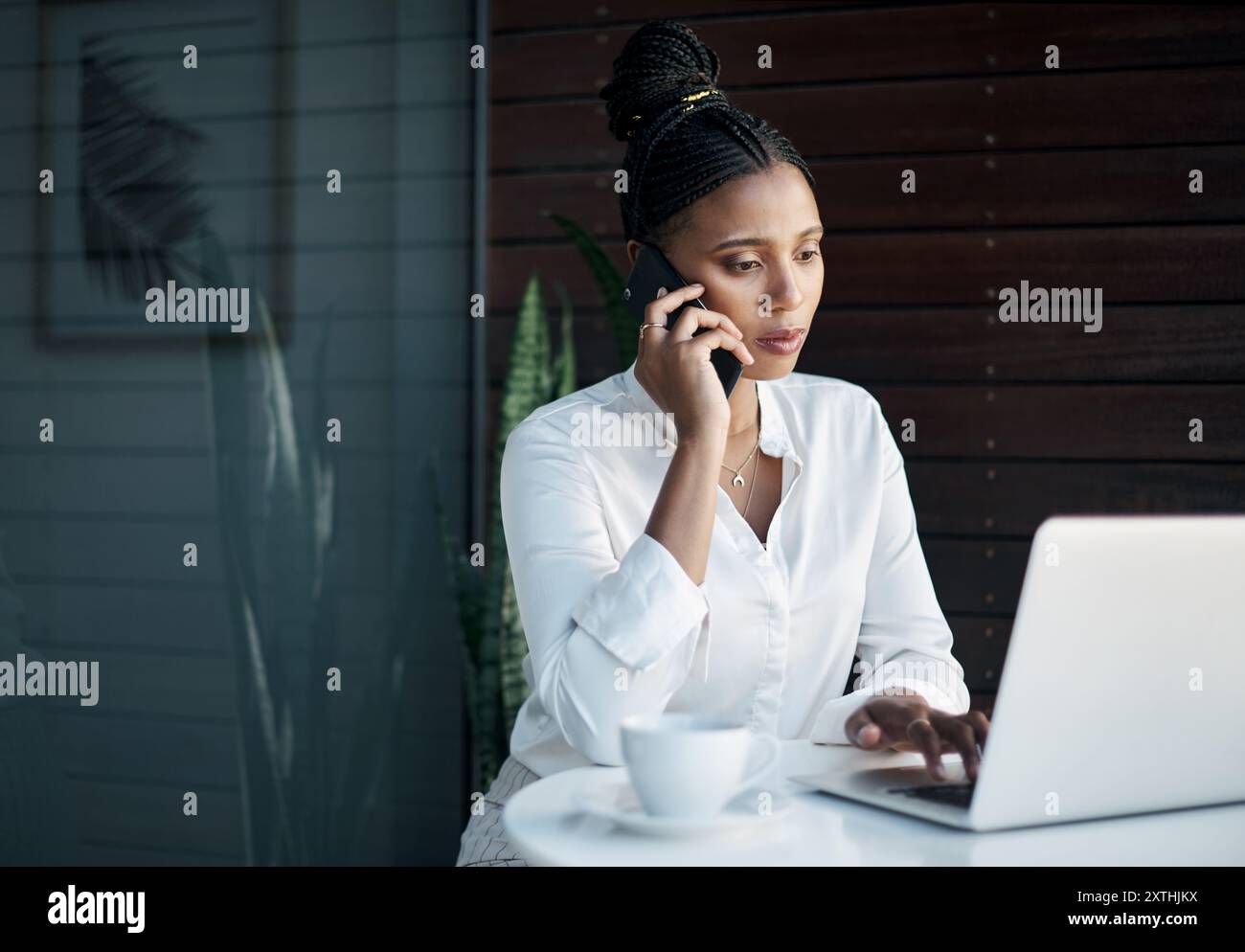 Black woman phone call and laptop for typing in office digital notes