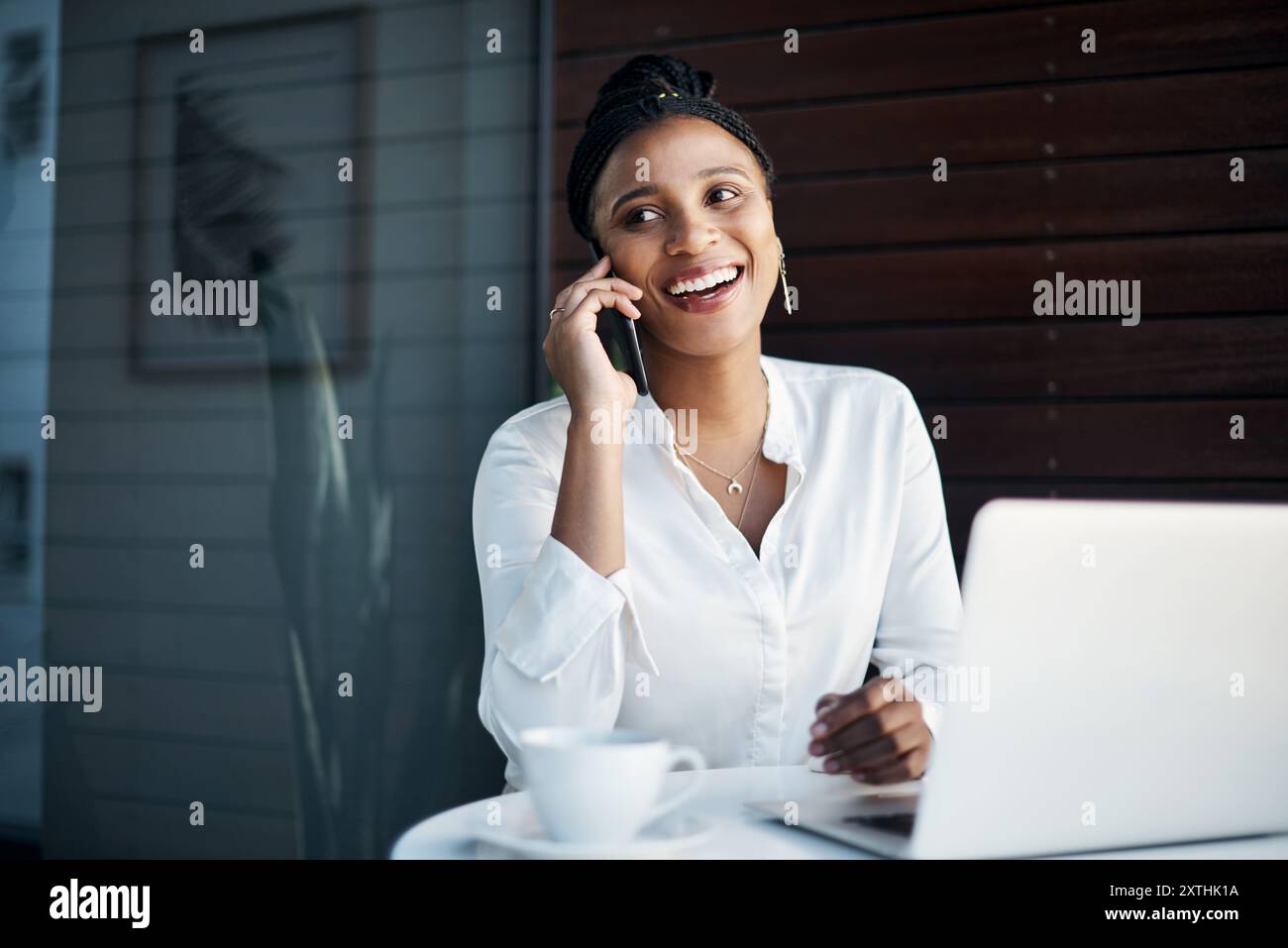 Black woman phone call and laptop for chat in office digital notes