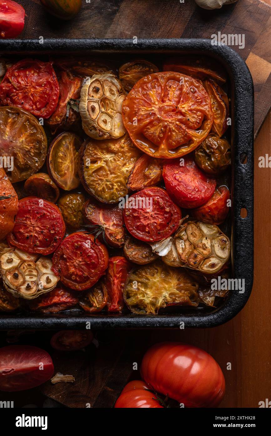 Whole sliced tomatoes in hi-res stock photography and images - Alamy
