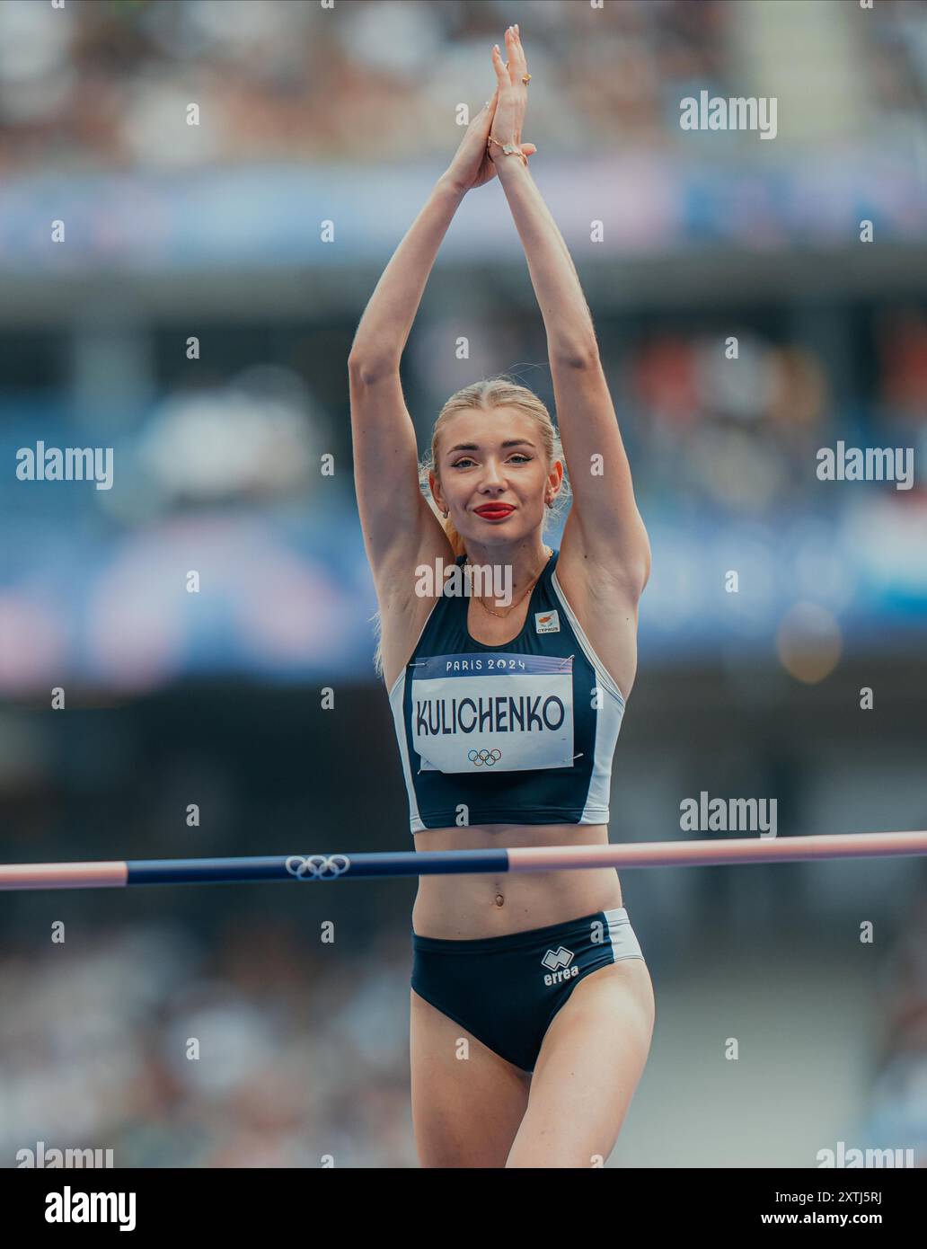 Elena Kulichenko participating in the high jump at the Paris 2024