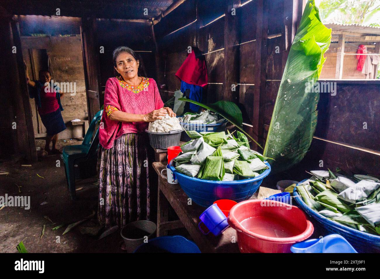 Preparing tamales for a celebration, Lancetillo, La Parroquia, Reyna area, Quiche, Guatemala, Central America Stock Photo